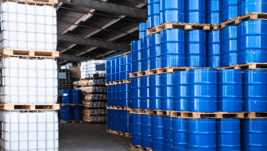 Plastic drums and IBC totes stored in a warehouse